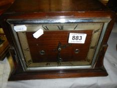 An old 3 hole mantel clock