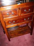 A mahogany 3 drawer side table