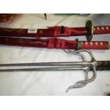 2 small Samurai swords and 2 other weapons