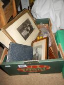 A box of old photographs etc