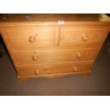 A 2 over 2 chest of drawers