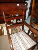 An old Victorian mahogany armchair