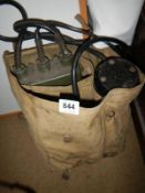 An old army mine detector in bag
