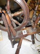 An old small spinning wheel