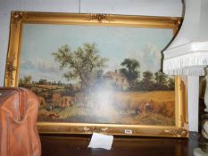 A large picture in gilded frame