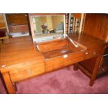 An old dressing table with lift up centre