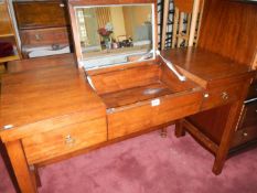 An old dressing table with lift up centre