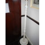 A white standard lamp