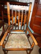 An old Edwardian oak arm chair