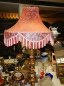 A large gilded table lamp