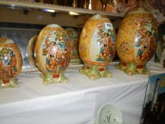 4 Chinese painted eggs