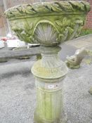 A large concrete garden urn