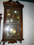 A wall clock and 1 other