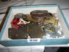 A box of old pad locks and old keys