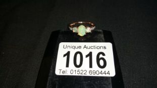 An opal & gilt silver ring marked '925'