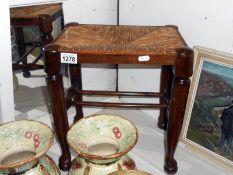 Tall oak foot stool with cane seat