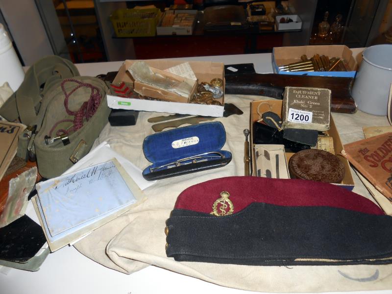 A quantity of Militaria including buttons, WW2 medals, dummy rifle, hats, gloves, - Image 3 of 5