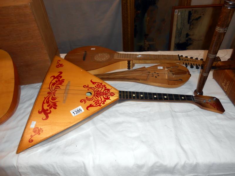 3 medieval style musical stringed instruments including balalaika