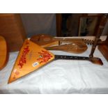 3 medieval style musical stringed instruments including balalaika