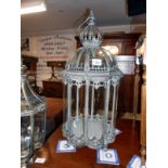 Verdigree metal and glass garden lantern