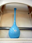 Tall light blue glass vase