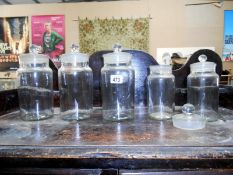 4 apothecary storage jars with lids & 1 other