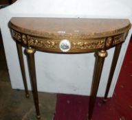 A gilt hall table with marble top