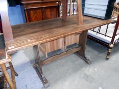 An oak table with stretcher base