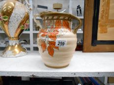 A large Charlotte Rhead floral table jug