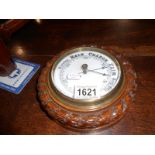 A small Aneroid barometer