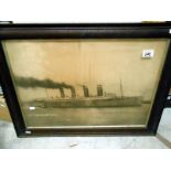 A framed and glazed photograph of Cunard Liner and Blue Ribbon holder Mauritania