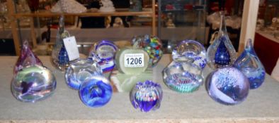 A quantity of paperweights including Caithness