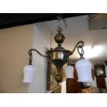 A brass 3 arm ceiling light