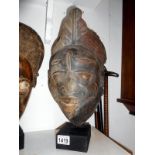 A Yoruba Gelede ceremonial mask from Nigeria approx 37.5 x 21 x 16.