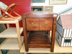 A pair of side tables with drawers