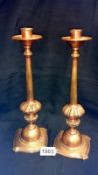 A pair of 19th century bronze candlesticks