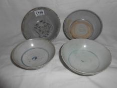 4 early Qing Chinese decorated blue and white rice bowls