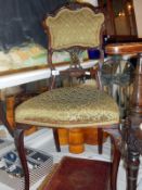 Victorian carved mahogany side chair with green upholstery and Queen Anne legs