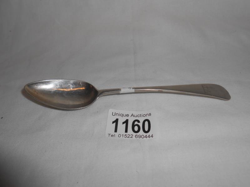 Silver spoon marked Toleken sterling with stag crest approx.