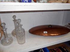 Copper foot warmer and 3 decanters