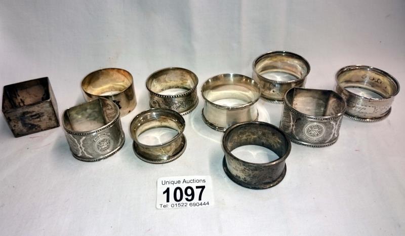 6 silver napkin rings (approximately 97gms) & 4 white metal rings