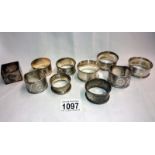 6 silver napkin rings (approximately 97gms) & 4 white metal rings