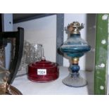 Cranberry glass oil lamp vessel and oil lamp base with blue glass font