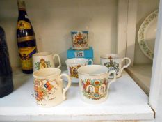 Quantity of commemorative mugs inc.