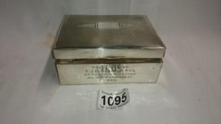 A silver art deco box with mahogany lining, Hallmarked Birmingham 1939. (Approximately 9cm x 11.