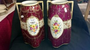 A pair of hand painted Japanese vases