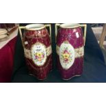 A pair of hand painted Japanese vases