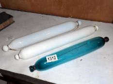 2 milk glass and 1 green glass rolling pins