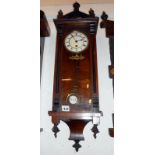A mahogany case wall clock