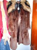 A Faux fur coat & shoulder wrap